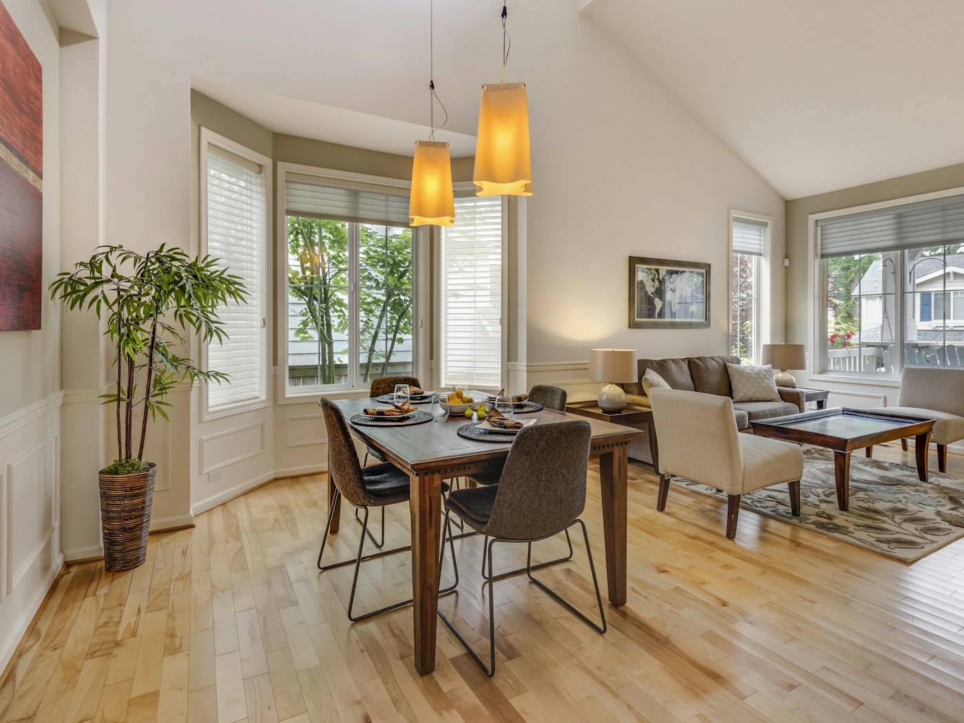 A bright kitchen and dining space set for a relaxed group meal