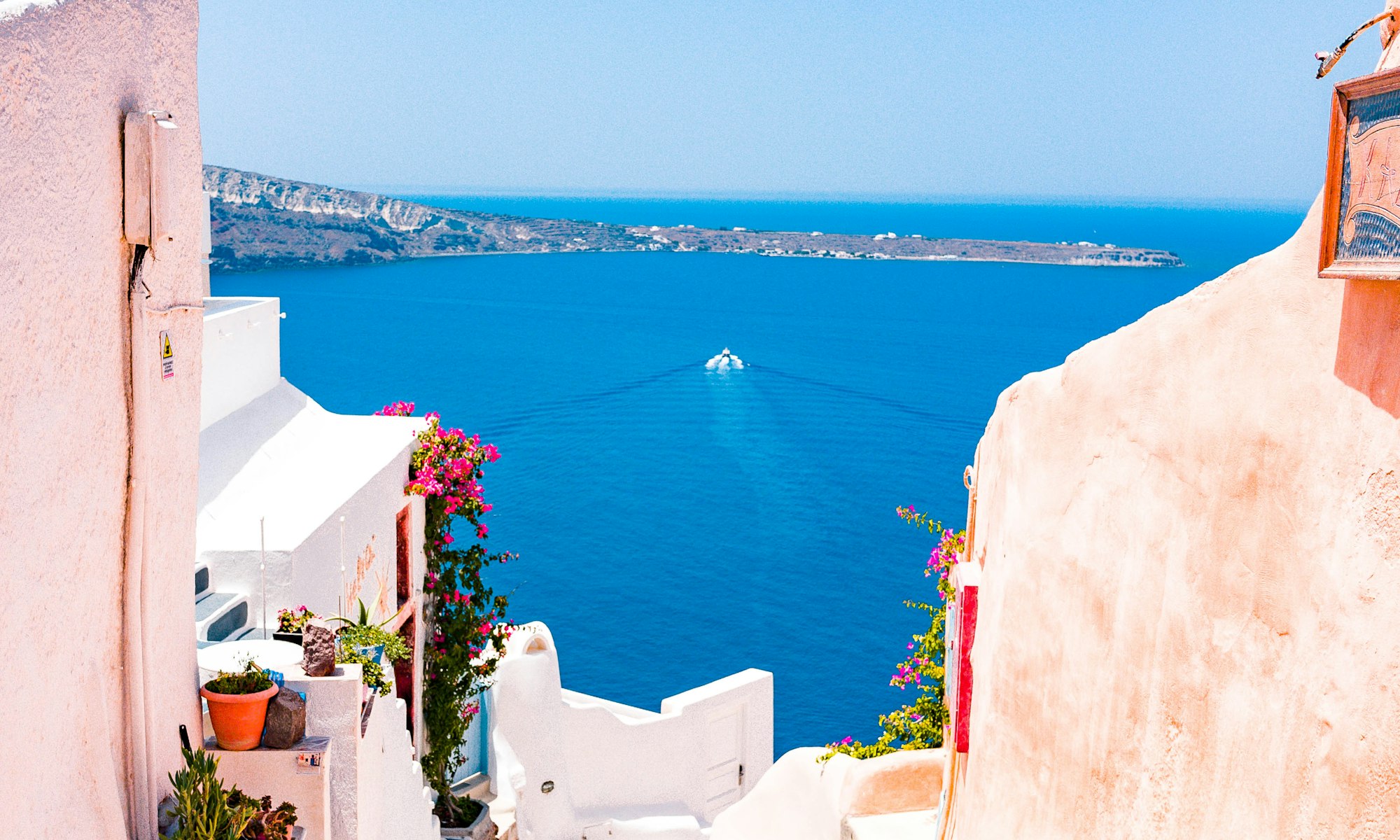 Whitewashed houses above the turquoise Mediterranean at Saïdia, Morocco