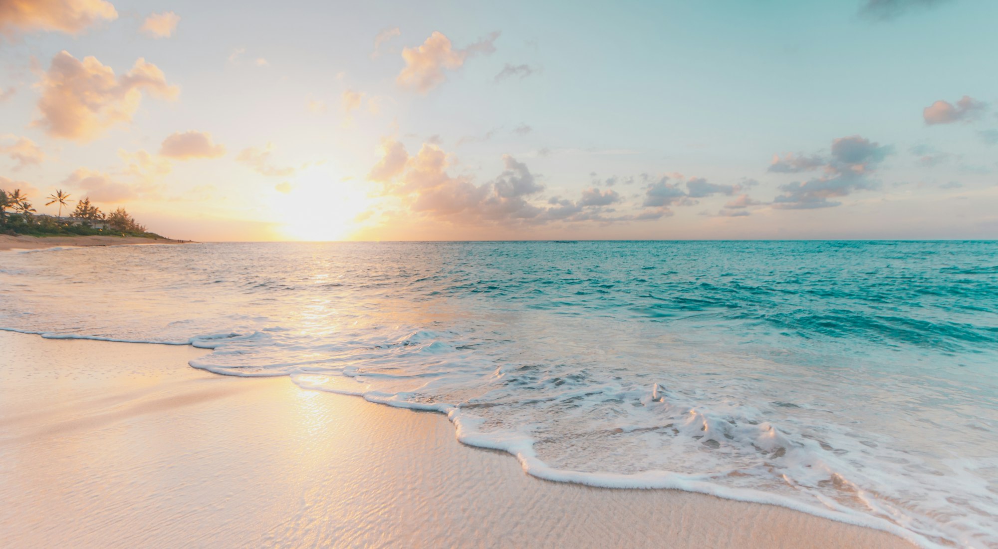 Copper sunset light spreading across Saïdia beach
